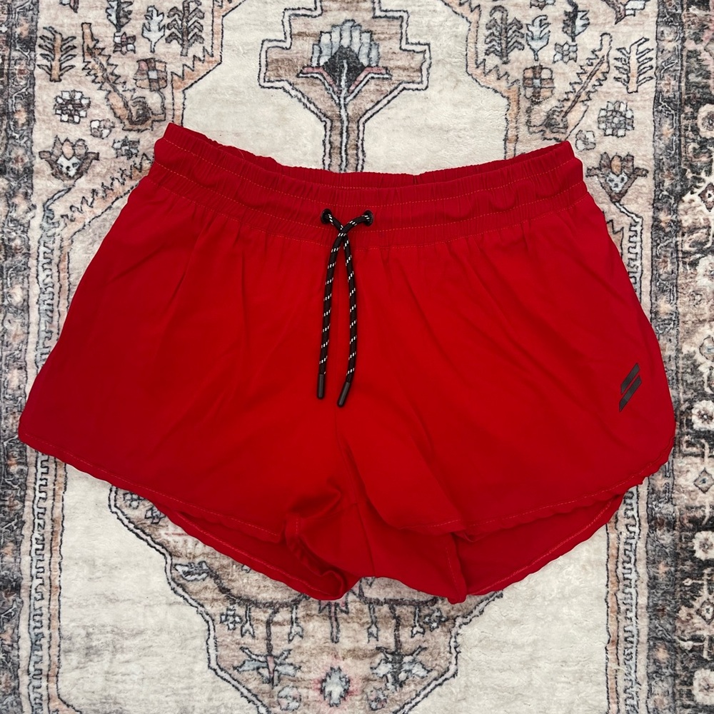 DOYOUEVEN Red Athletic Shorts with Lace-Up Detail